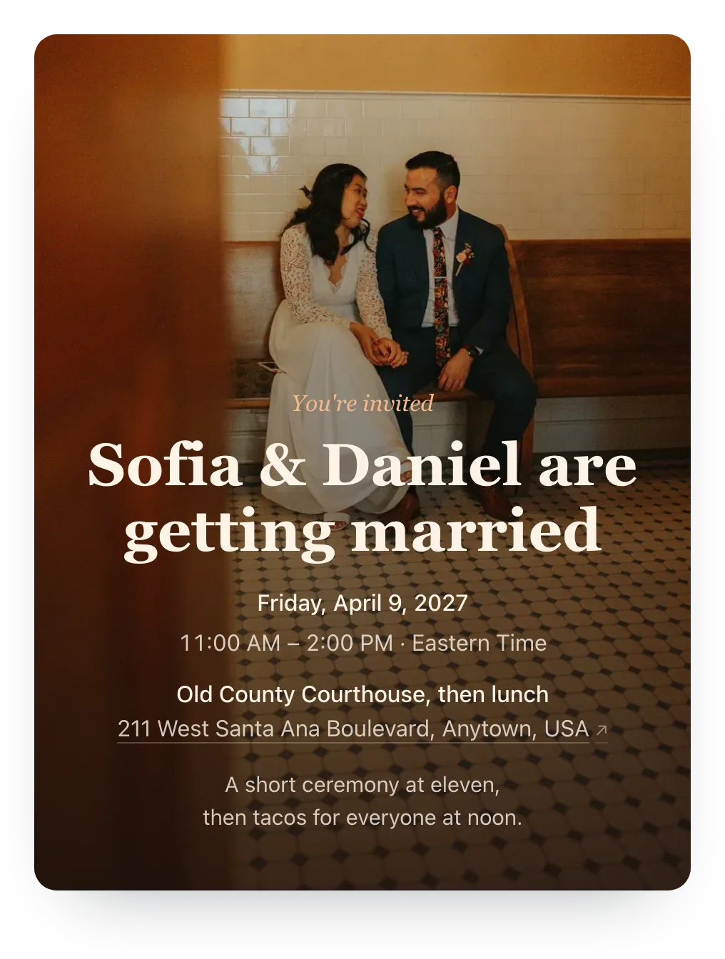 Courthouse wedding invitation with the couple’s own photo as the cover: a just-married couple sitting close on a bench in a courthouse hallway, behind “Sofia & Daniel are getting married”